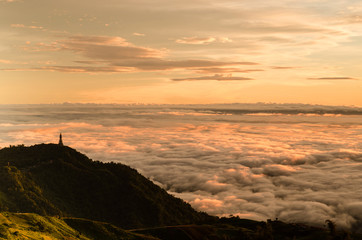Dramatic sunrise over valley of fog