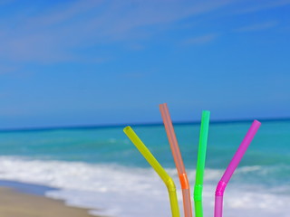 Fototapeta na wymiar straw beach drink