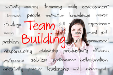 Obraz premium Business hand writing team building concept. Office background.