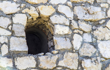 Fototapeta na wymiar loop-hole in the fortress