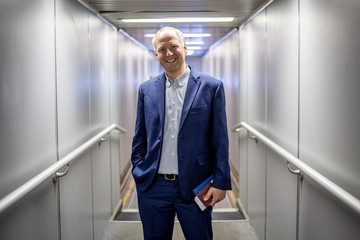 Businessman leaving the plane.