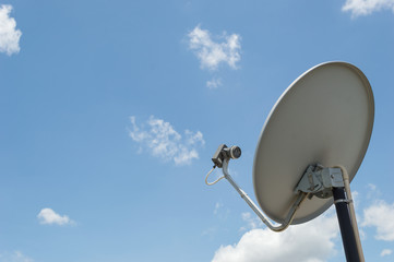 Satellite dish outdoor on blue sky background