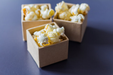 Sweet caramel popcorn on the paper boxes