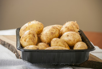 Potatoes close up on the table
