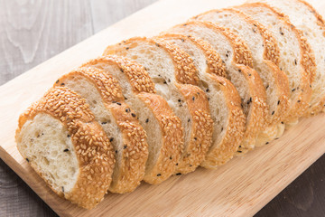 Fresh whole grain bread on the wooden table