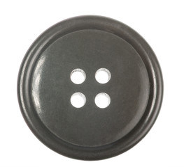 grey single button with four holes isolated on white