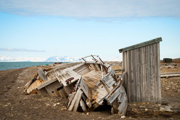 Abandoned ship on the shore in Svalbard