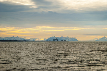 Fototapeta na wymiar Industrial pier in the Arctic sea, Svalbard