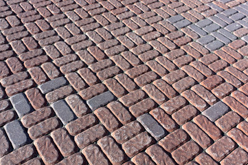 Red and gray stones pavement closeup