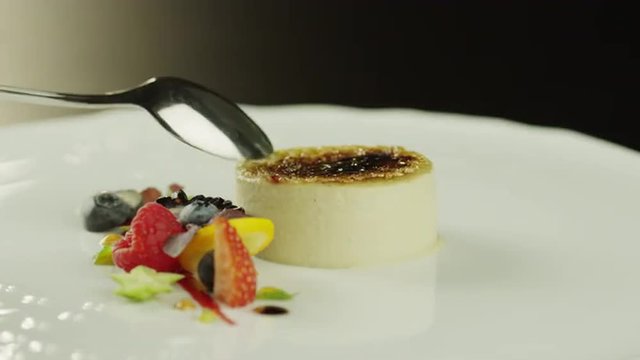 Creme Brulee Dessert with Berries on White Plate 4K