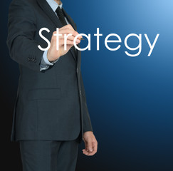 businessman writing strategy