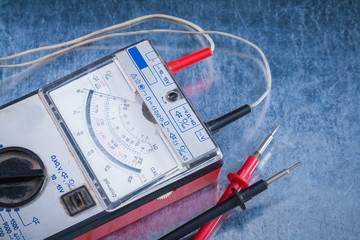 Electricians control panel on scratched metallic surface constr