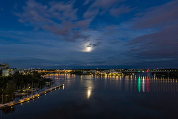 Fototapeta na wymiar Full moon rising over Stockholm, Stockholm, Sweden