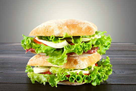 Sandwich with mozzarella, tomato and lettuce