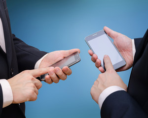Busniness man hand using smart phone