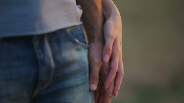 Men and women hand in hand.