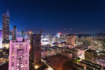 Naklejka premium panorama of skyscrapers in a modern city at night
