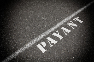 Payant on asphalt road
