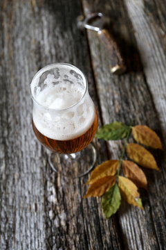 Autumn mood: beer and yellow leaves