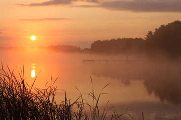 foggy lake at sunrise