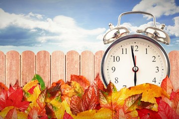 Composite image of alarm clock