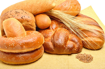 bread, buns, rolls on the tablecloth isolated on white