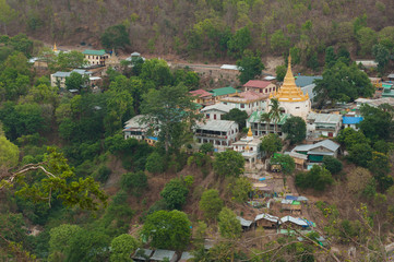 Fototapeta na wymiar Golden pagodas is on Sagaing Hill, Myamar. View frm the top of t