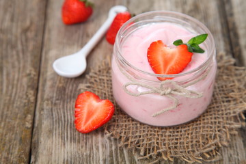 Strawberry yogurt and ripe strawberry