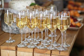Glasses with champagne on the party table