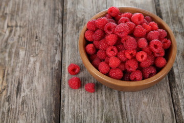 Ripe raspberries in a bowl