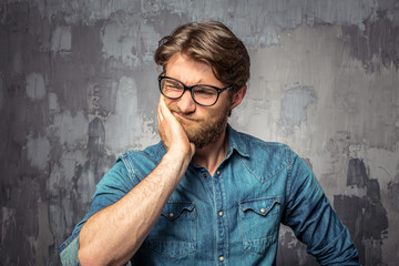 Closeup of a young man who forgot something important