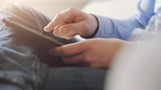 businessman hands using tablet computer online shopping working from home