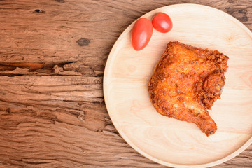 Fried chicken in wood dish
