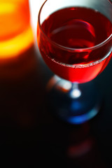 Red drink with orange bottle