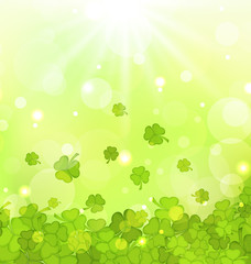 Glowing background with shamrocks for St. Patrick's Day