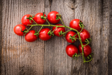 tomatoes on a wooden background