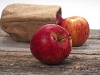 Apples on an old wooden table