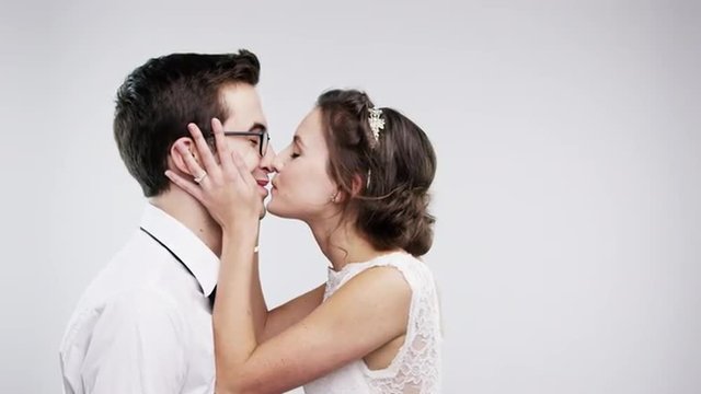 Married couple kissing slow motion wedding photo booth series