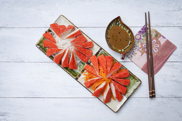 Japanese food design background, crab stick with carrot and radish 