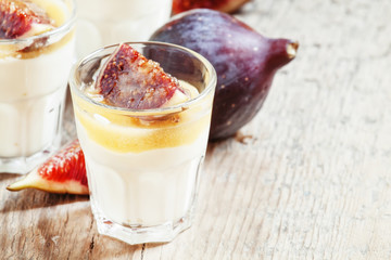 Homemade yogurt with  figs and  honey, selective focus