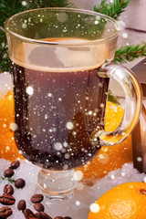 hot coffee tangerines in the winter snow christmas