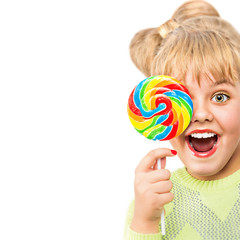 Portrait of a cheerful girl with candy on a white background.