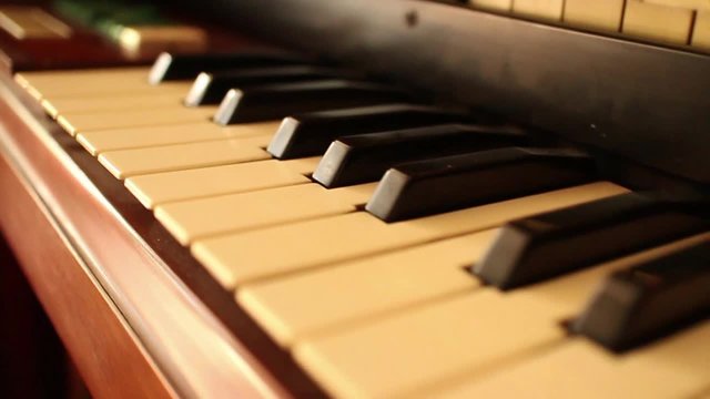 CURRENT SHOT (one of a series): 60 fps native slo-mo (can be speeded up to normal speed), reverse CU dolly back along keys, showing only one level of keys