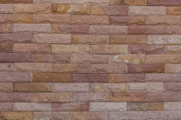 Plain stone wall for background.