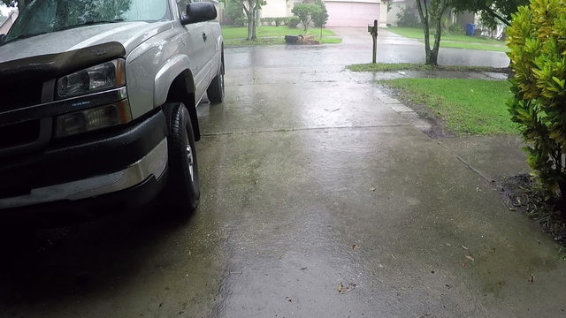 Raining driveway parked truck Florida 