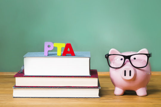 PTA theme with pink piggy bank with chalkboard