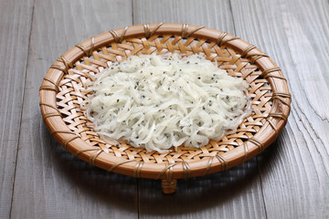 icefishes, noodlefishes on japanese bamboo strainer
