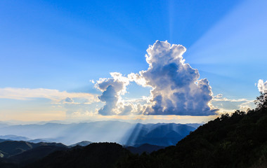 Blue sky with sunbeam