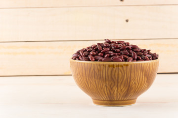 red  beans on wood background