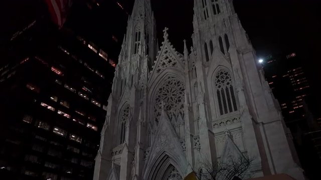 Low angle shot of New York's magnificent gothic St. Patrick's cathedral at night.